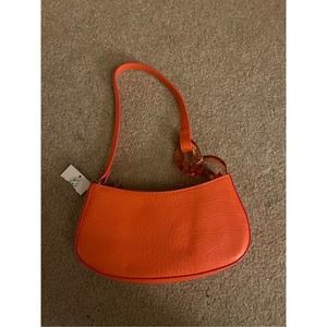 New Small Orange Handbag with Decorative Side Piece
